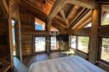Experience the charm of this stunning wooden chalet, boasting a cozy and inviting atmosphere.