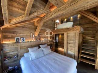 Experience rustic luxury in this stunning wooden chalet.