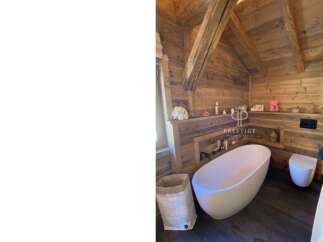 Experience luxury in this stunning bathroom featuring a modern freestanding tub.