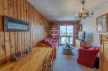 Cozy ski chalet with rustic wooden accents.