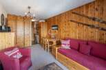 Cozy alpine retreat! This charming property features warm wooden interiors, creating a welcoming atmosphere.
