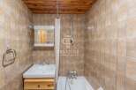 Discover a charming bathroom with a classic design.