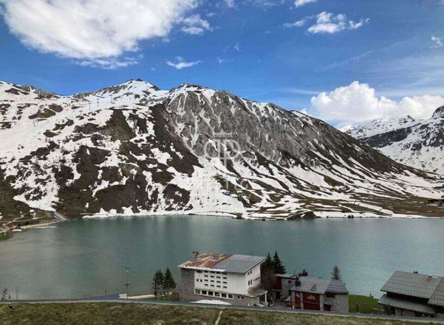 Discover breathtaking mountain views and serene lakefront living.