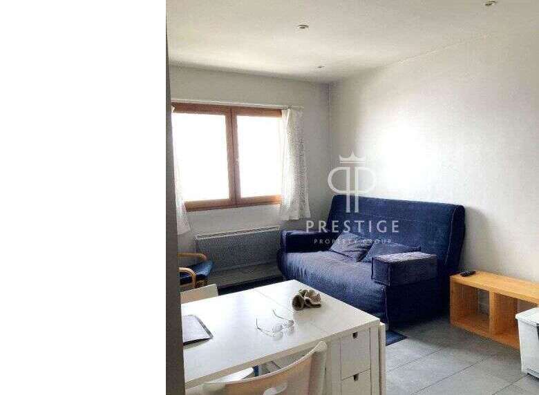 Discover this charming property featuring a cozy living space with a comfortable sofa.