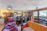 Experience breathtaking mountain views from this cozy property.
