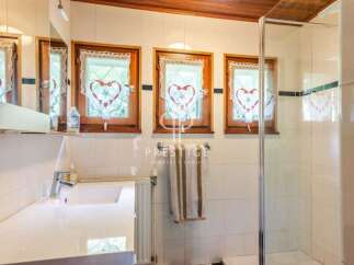 Charming bathroom with a touch of rustic elegance.