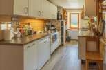 Discover a charming kitchen with modern amenities.