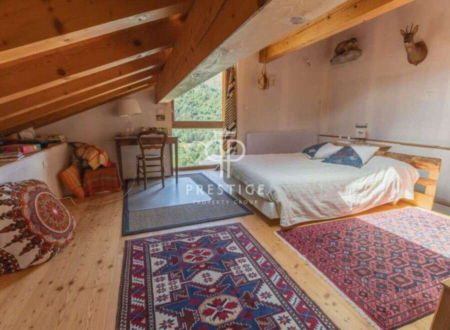 Discover a cozy bedroom retreat with rustic charm.
