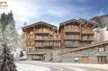 Discover luxury living in this stunning chalet nestled in a winter wonderland.