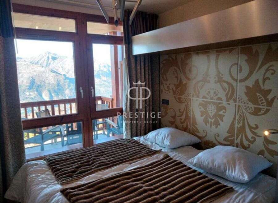 Experience breathtaking mountain views from this luxurious property.