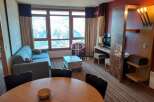 Experience luxury living in this stunning property, featuring a spacious living area with breathtaking mountain views.