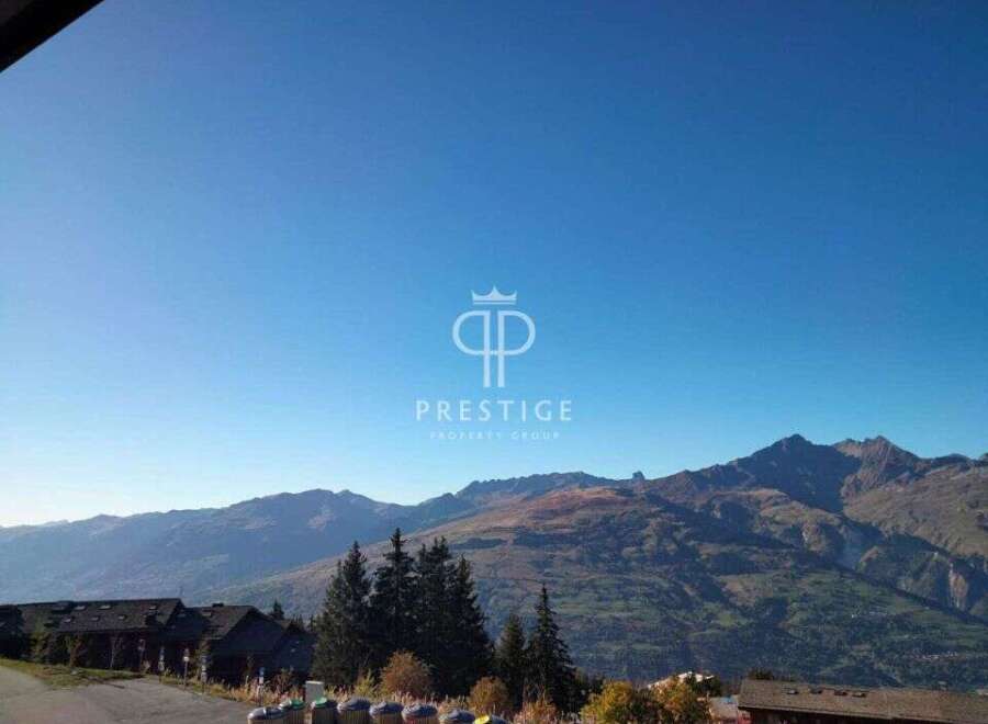 Experience breathtaking mountain views from this stunning property.