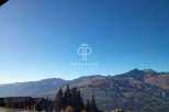 Experience breathtaking mountain views from this stunning property.