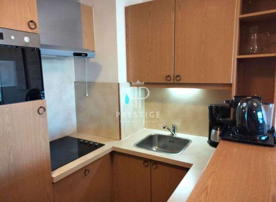 Discover a cozy kitchen space, perfect for preparing meals.