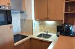 Discover a cozy kitchen space, perfect for preparing meals.