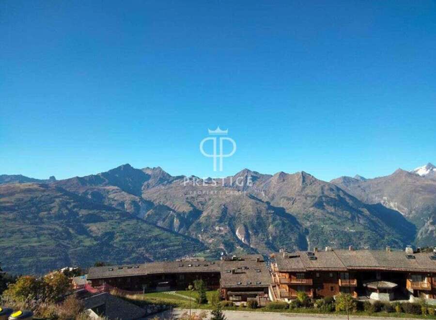 Experience breathtaking mountain views from this stunning property.