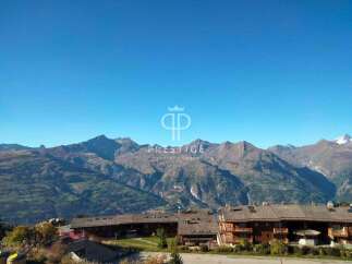 Experience breathtaking mountain views from this stunning property.