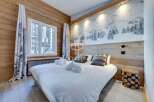 Experience the ultimate in cozy luxury in this stunning bedroom.