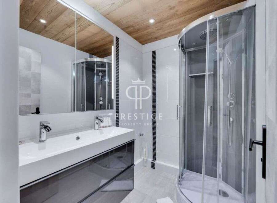 Discover luxury living in this stunning property! Featuring a modern bathroom with a sleek design, this space offers both style and functionality.