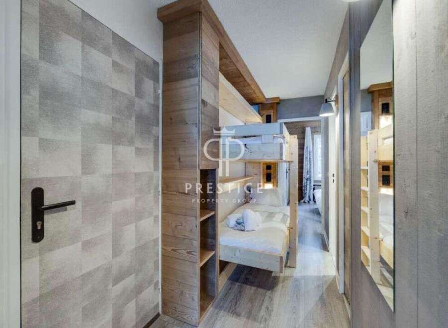 Discover the charm of this cozy property, featuring a unique bunk bed setup perfect for families or groups.