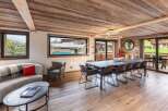 Experience luxury living in this stunning property, featuring a spacious dining area perfect for entertaining.