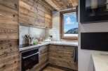 Experience the epitome of alpine luxury in this stunning kitchen.