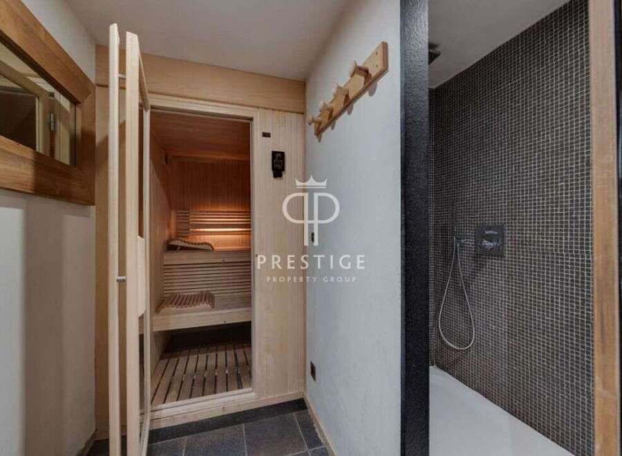 Discover the epitome of relaxation in this luxurious property, featuring a private sauna for ultimate comfort.