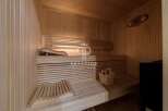 Step into your private oasis with this stunning sauna.