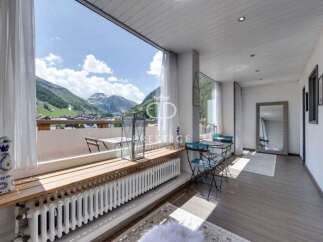 Experience breathtaking mountain views from this stunning property.