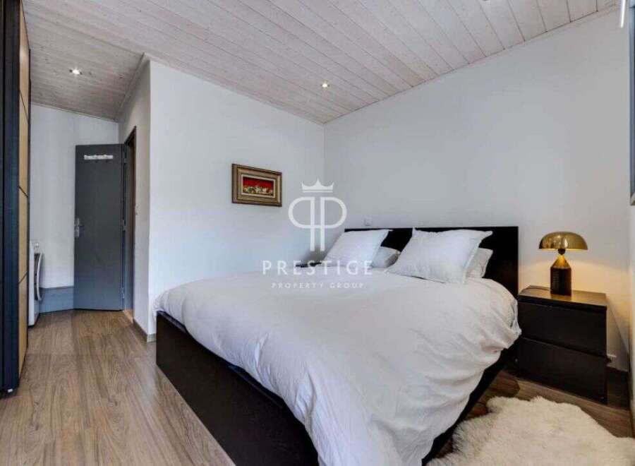 Discover the epitome of comfort in this stylish bedroom.