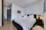 Discover the epitome of comfort in this stylish bedroom.