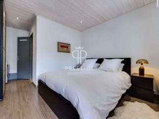 Discover the epitome of comfort in this stylish bedroom.