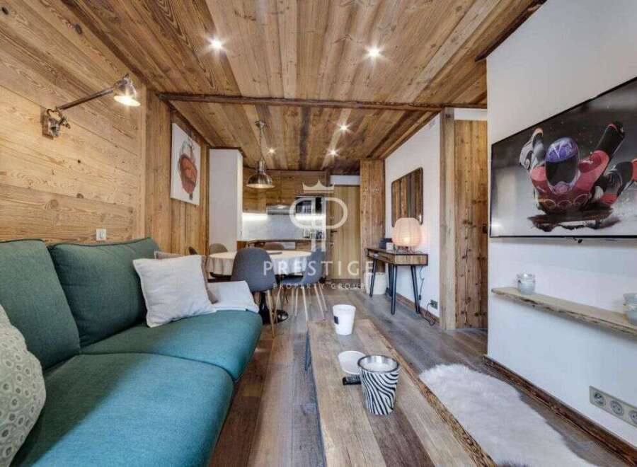 Experience the charm of this cozy apartment, featuring stunning wooden accents throughout.