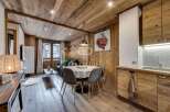 Experience rustic charm in this stunning property, featuring exquisite wooden paneling throughout.