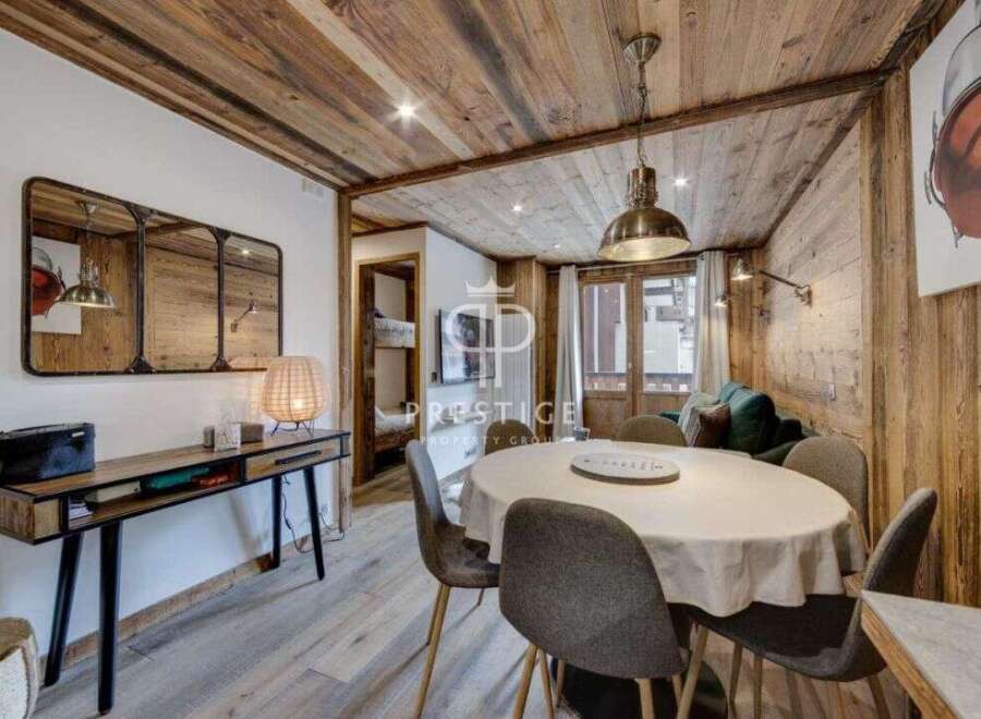 Experience rustic charm in this stunning property, featuring exquisite wooden paneling throughout.