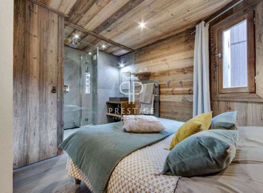 Experience rustic luxury in this stunning bedroom.