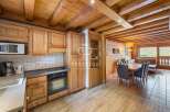 Discover the charm of this stunning property, featuring a beautifully designed kitchen with wooden cabinetry and modern appliances.