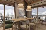 Experience luxury living in this stunning property, featuring a beautifully designed dining area.