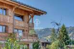 Discover the epitome of alpine luxury in this stunning wooden chalet.