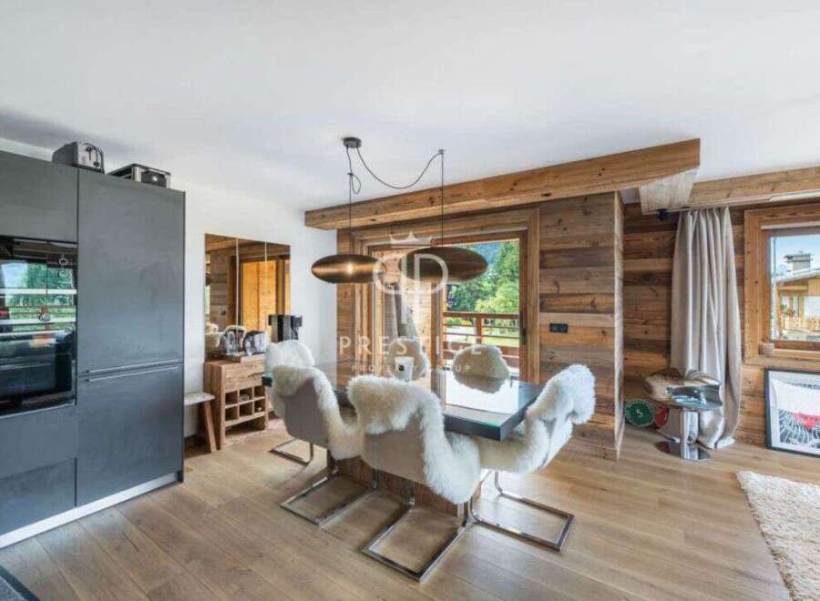 Experience luxury living in this stunning property, featuring a modern kitchen with sleek appliances.