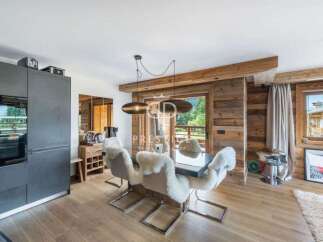 Experience luxury living in this stunning property, featuring a modern kitchen with sleek appliances.