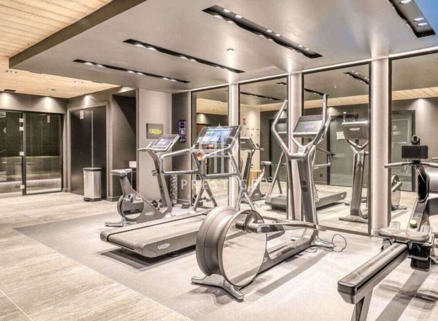 Experience the epitome of fitness in this state-of-the-art gym, fully equipped with modern exercise machines.