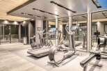 Experience the epitome of fitness in this state-of-the-art gym, fully equipped with modern exercise machines.