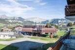 Enjoy breathtaking mountain views from this charming property.