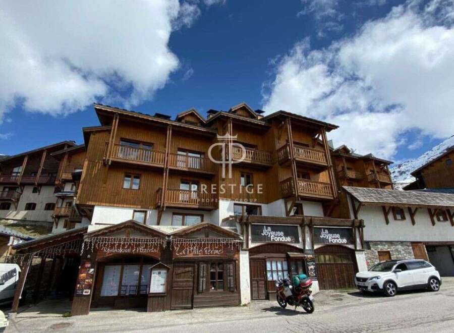 Discover a charming property nestled in a picturesque mountain setting.