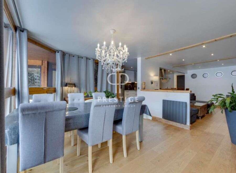 Discover luxury living in this stunning property, featuring a spacious dining area perfect for entertaining.