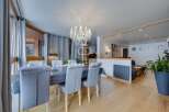 Discover luxury living in this stunning property, featuring a spacious dining area perfect for entertaining.