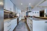Experience modern luxury in this stunning kitchen.