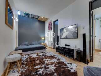 Discover modern luxury in this stunning bedroom.