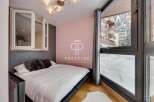 Discover a cozy bedroom with a stunning view.